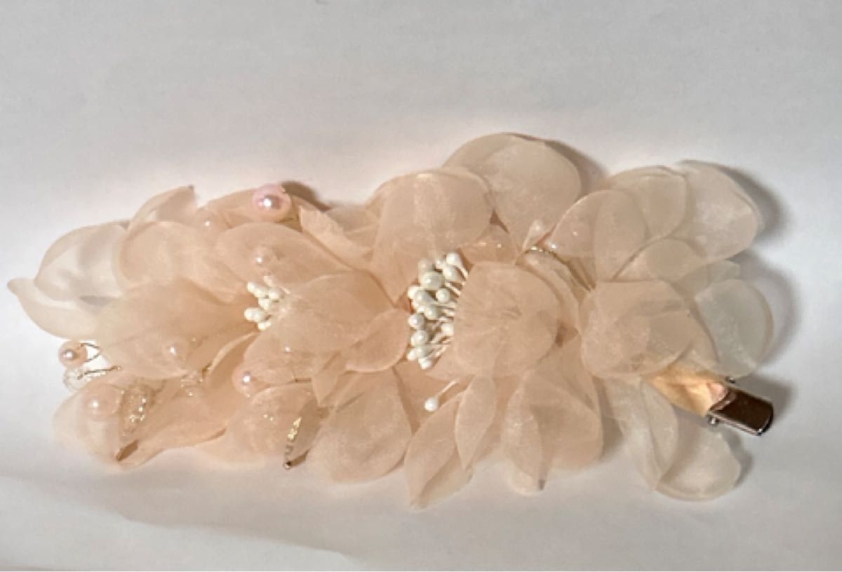 ヘアクリップ　薄オレンジ色二手;物流保障;未使用